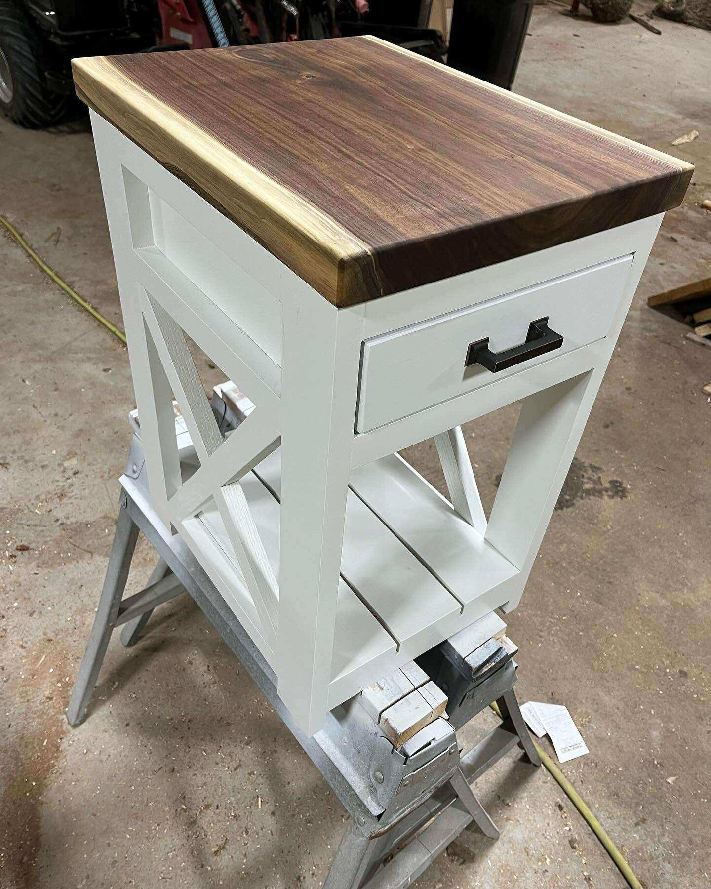 Handcrafted white shaker-style end table with a walnut wood top, drawer pull, and lower shelf